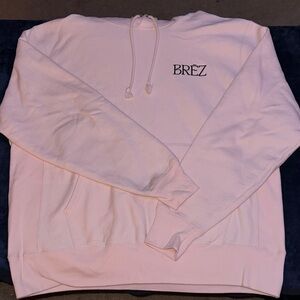 Champion Light Pink Reverse Weave Hoodie with BREZ logo